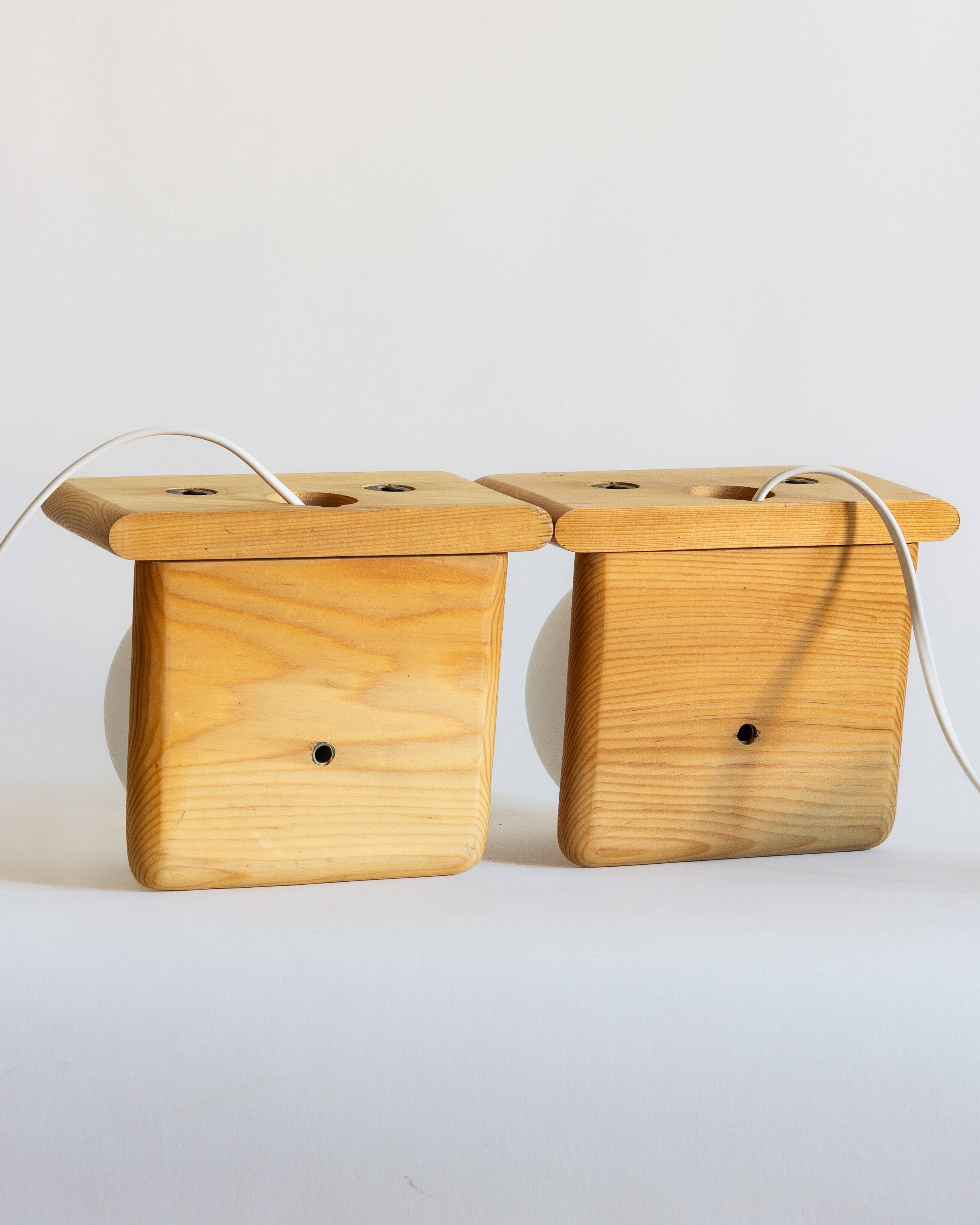 Duo of pine and opaline glass wall lights, 1980s