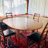Expandable teak dining table, butterfly extension, circa 60s