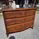 Curved commode in Louis XV style made of cherry wood.