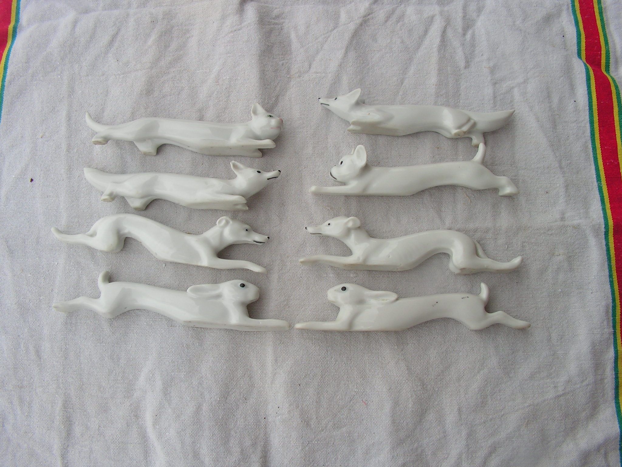 Set of expensive rests in faience in the shape of animal dog rabbit cat fox