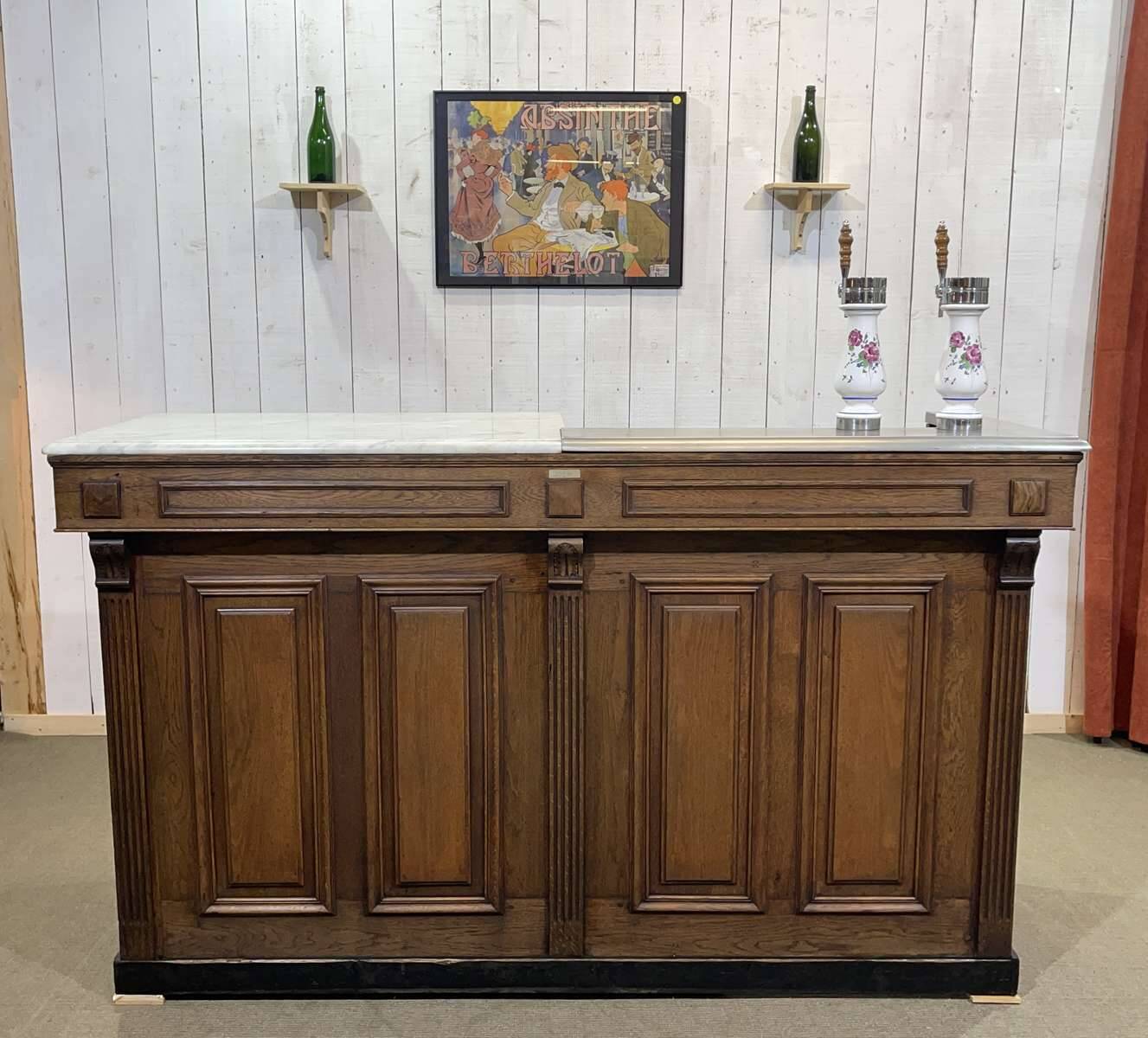 Bar counter in oak, zinc, and white marble from the early 20th century.