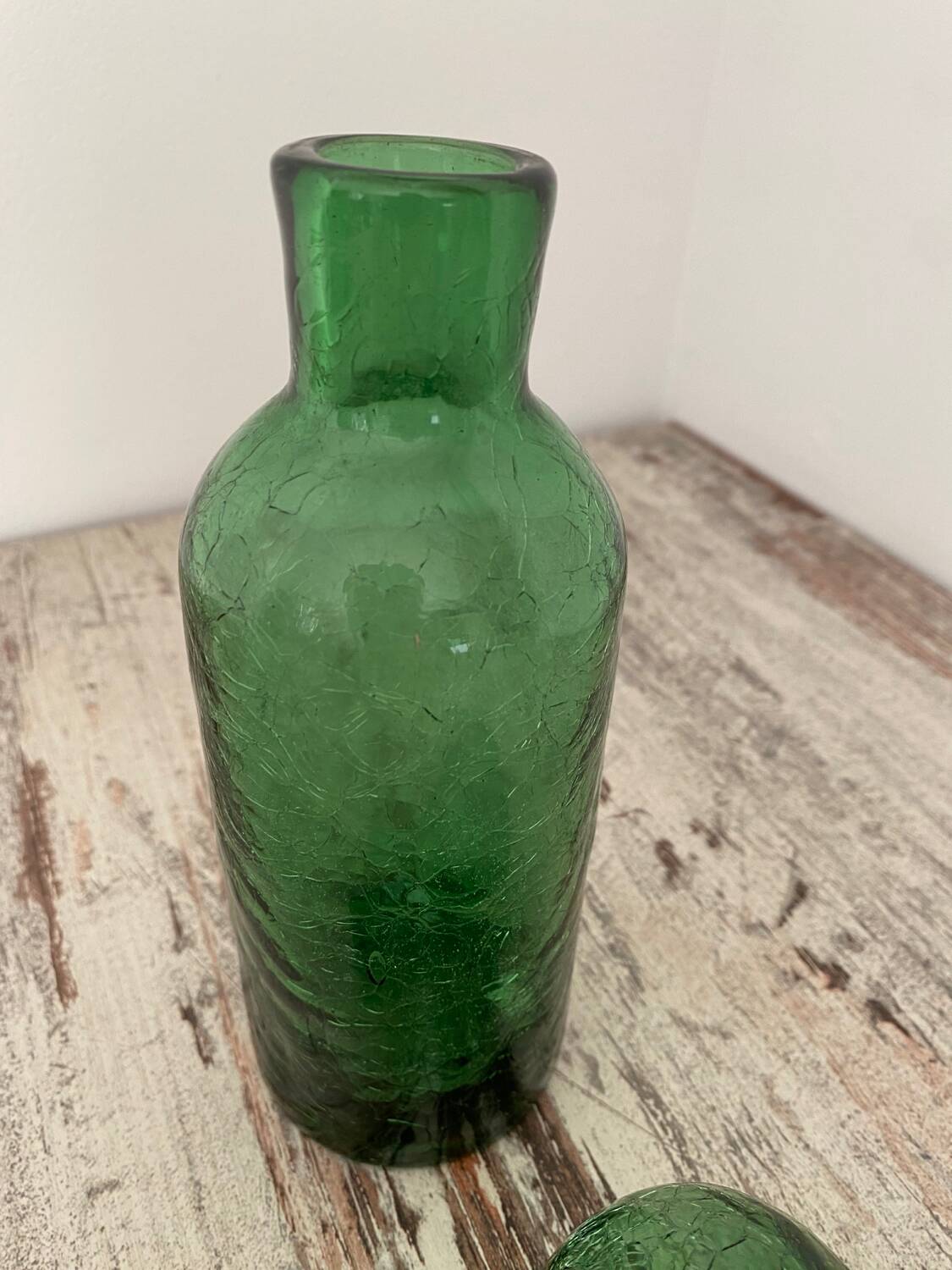 Old cracked glass carafe