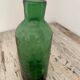 Old cracked glass carafe