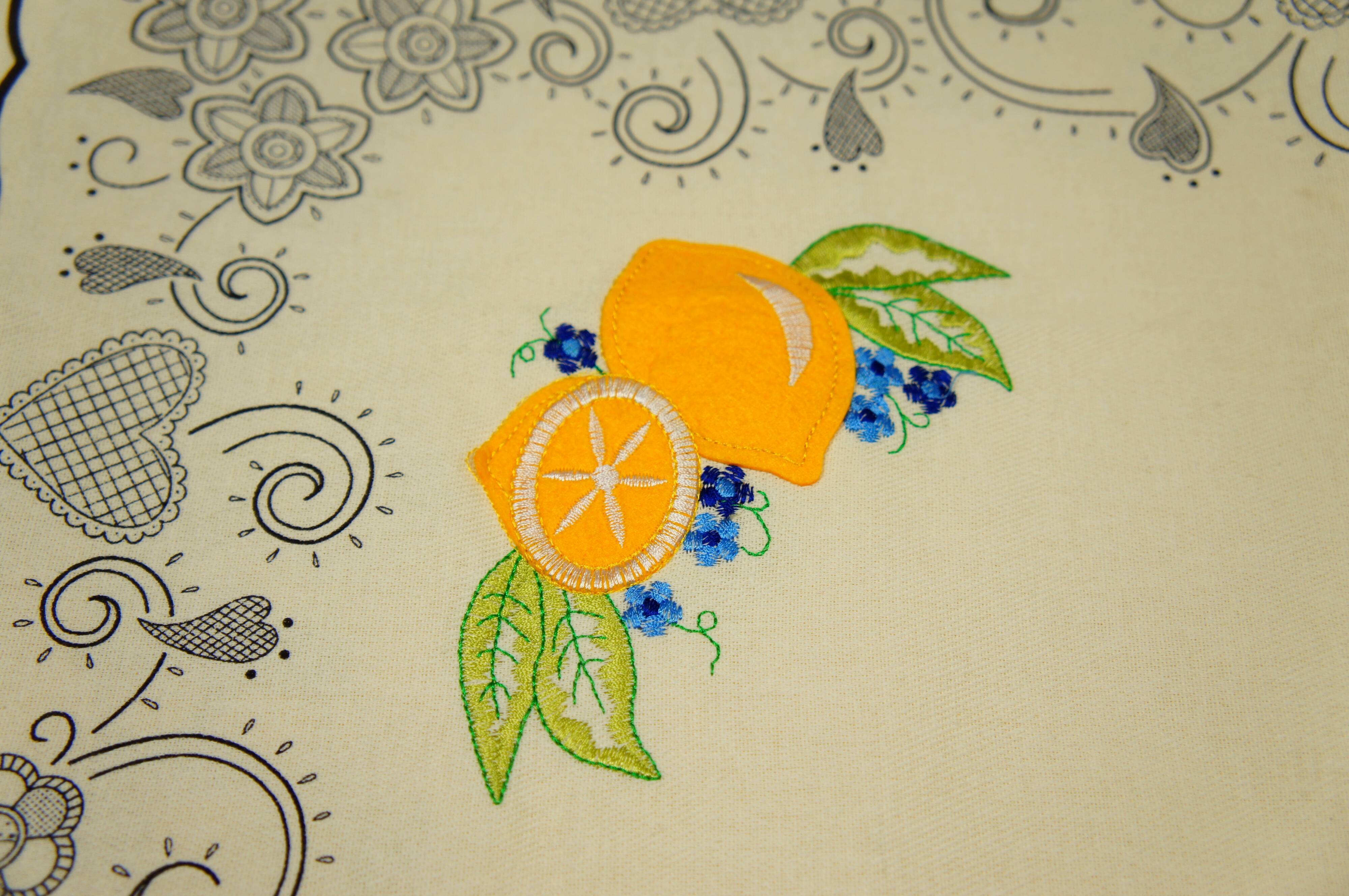 Old cloth embroidered "lemons"