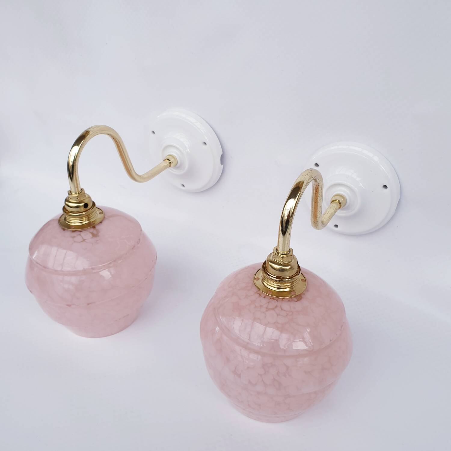 pair of vintage speckled pink and brass wall lights