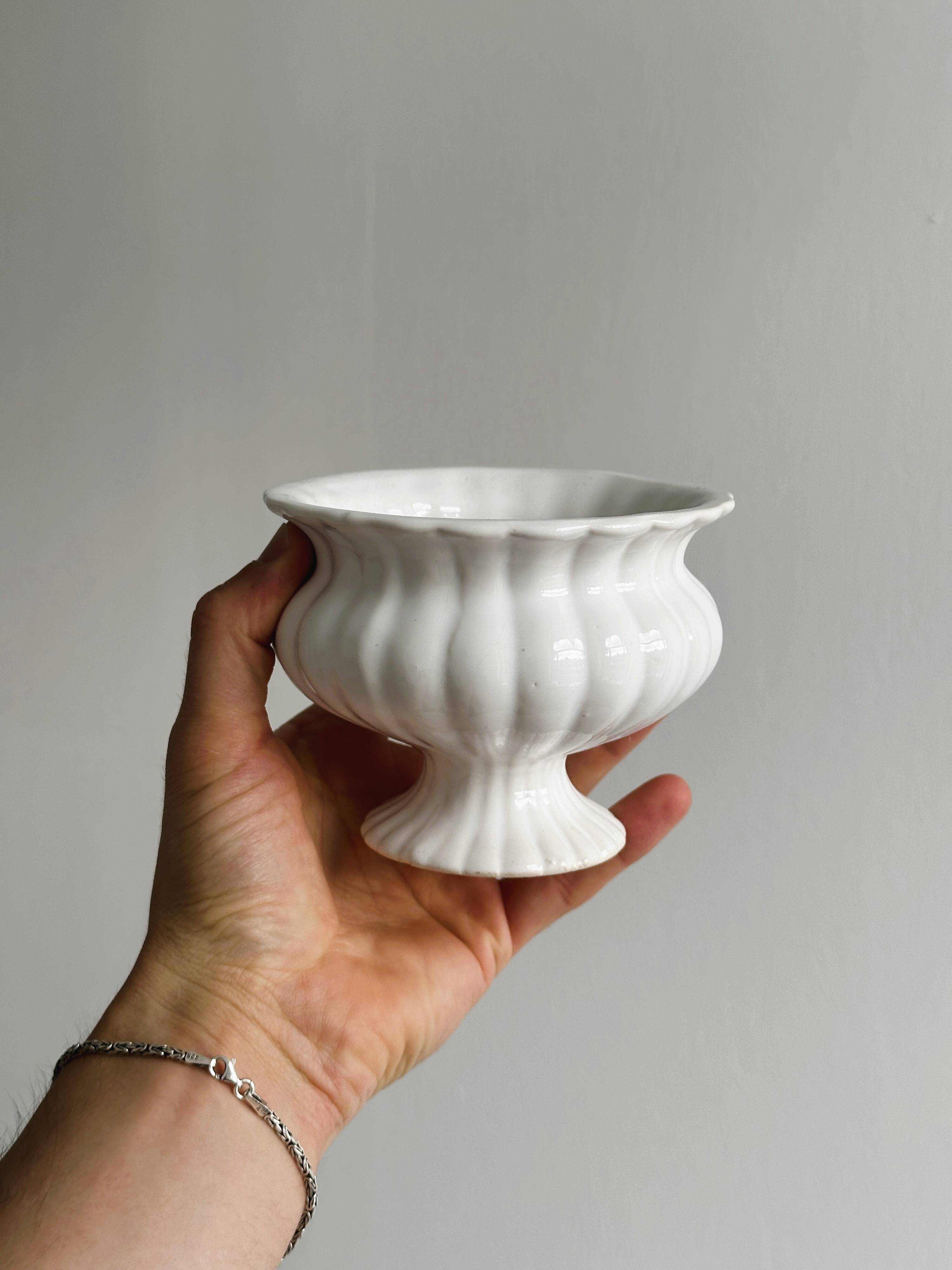 Small white ceramic flowerpot or bowl on foot