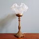 Table lamp in gilded bronze with opalescent glass shade, early 20th century.
