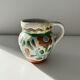 Small floral jug signed