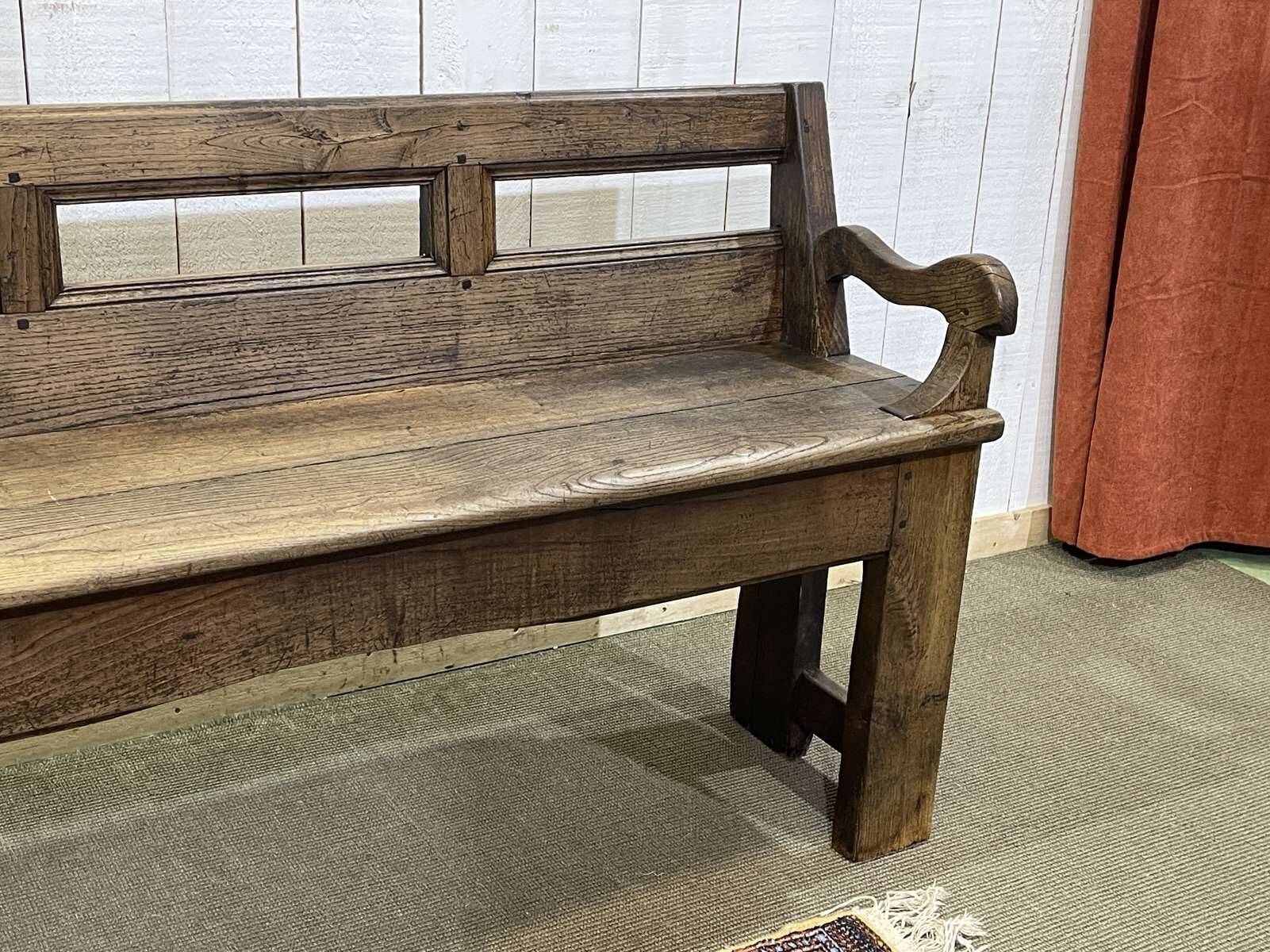 Rustic chestnut bench from the late 19th century.