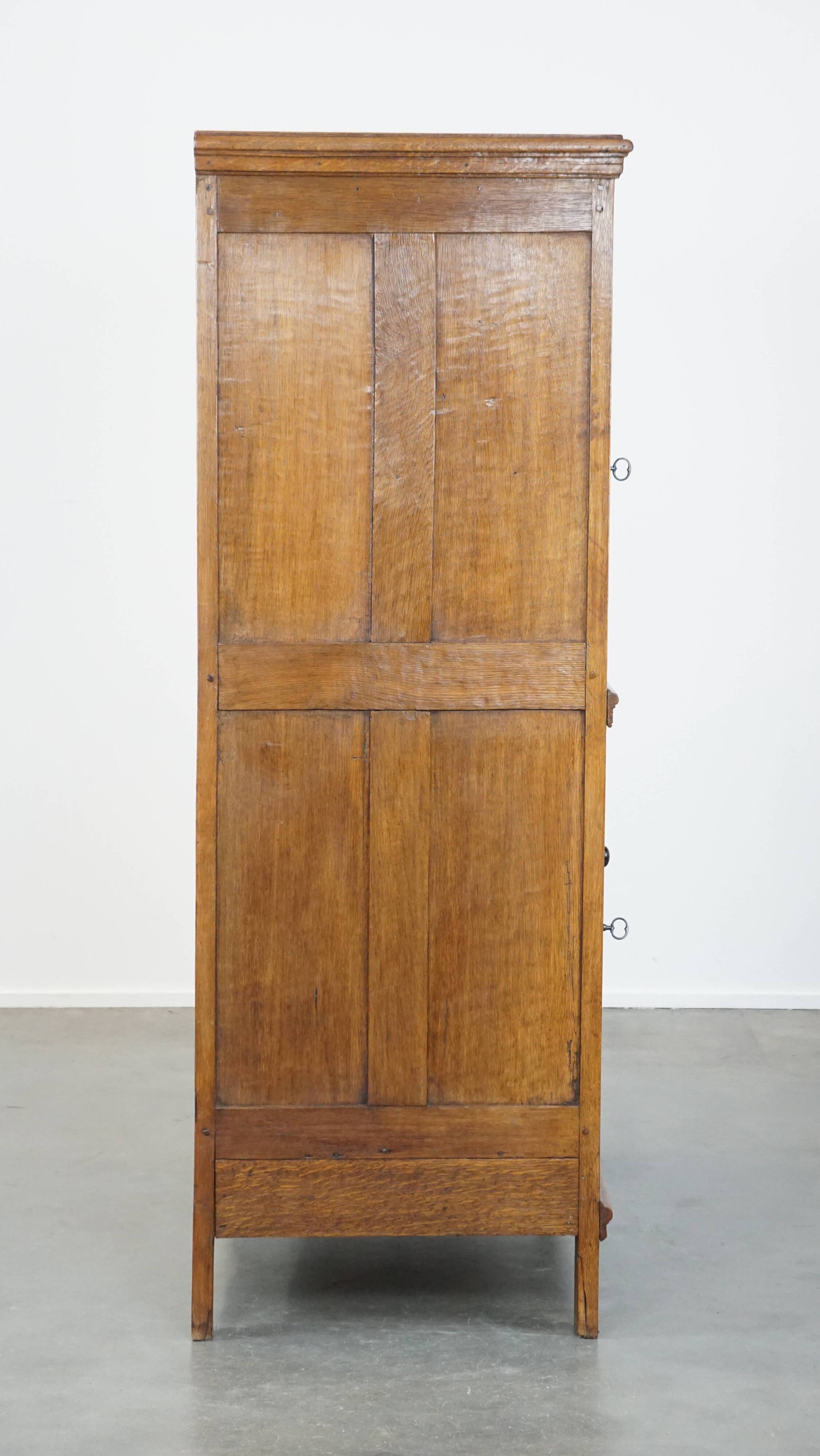 Antique oak bread cabinet from the late 17th century with working locks