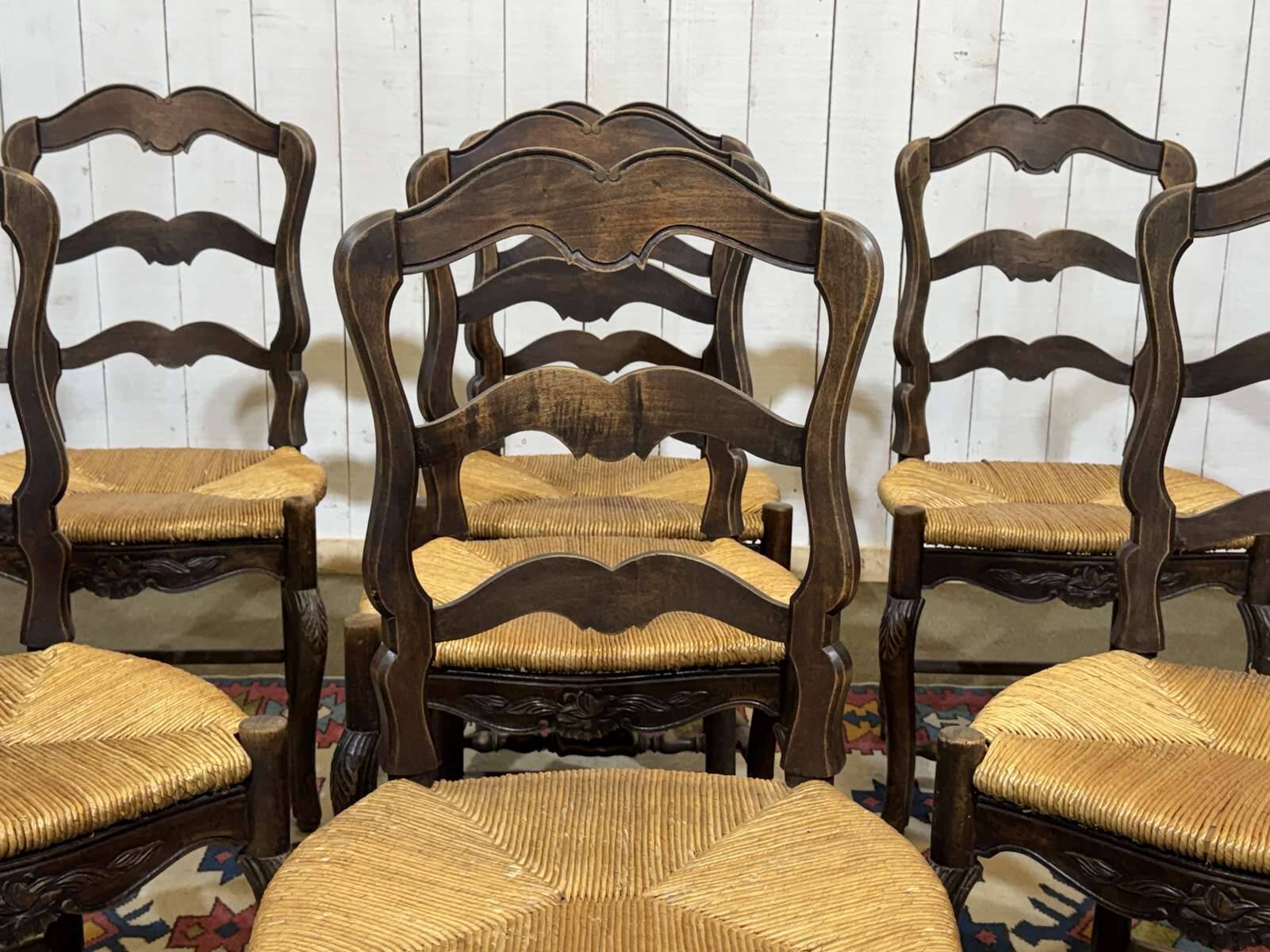 Set of 7 Louis XV style beech chairs with straw seats.