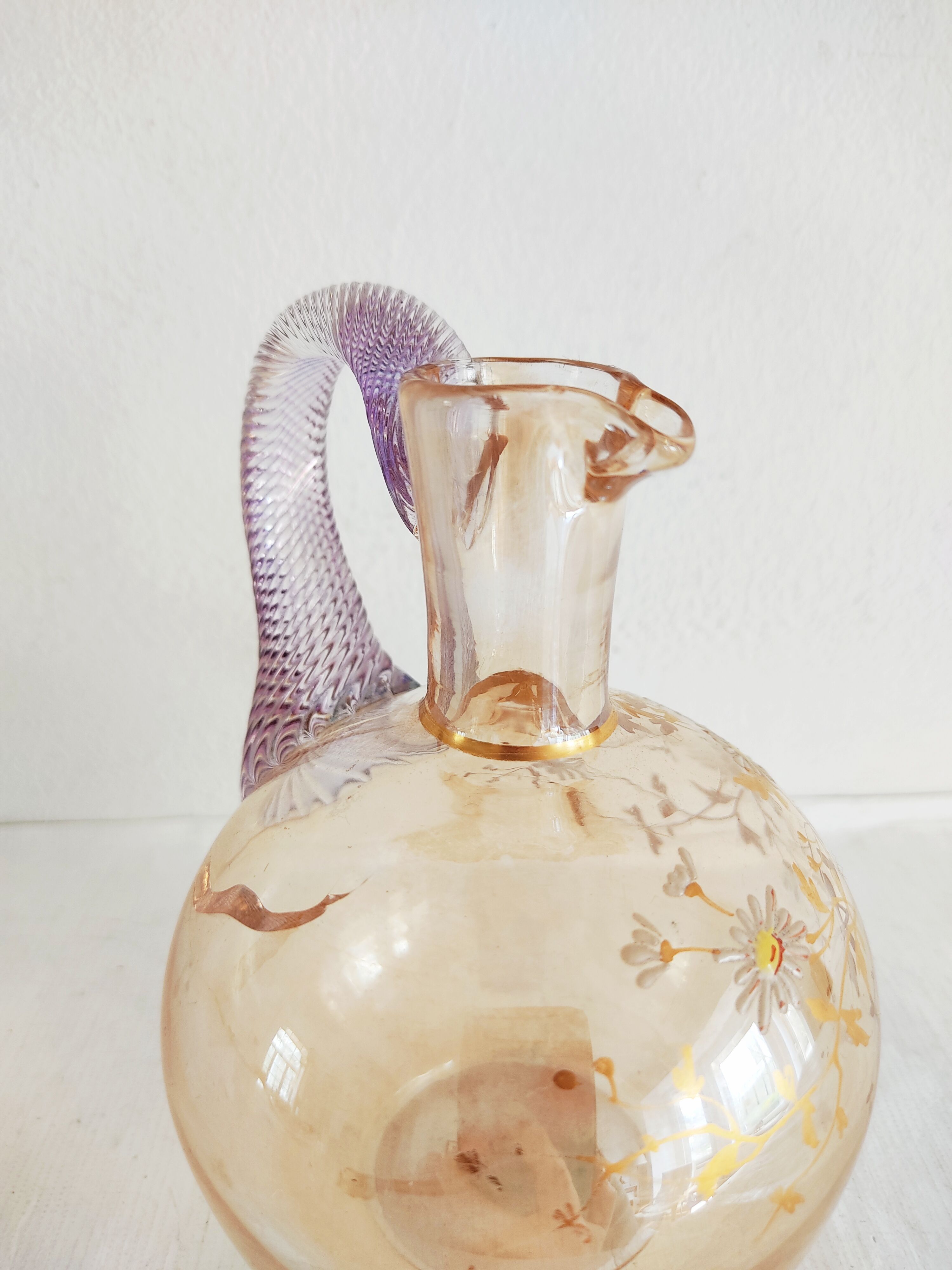 Glass pitcher decorated with 19th century flowers