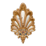 Palm-shaped faceted mirror