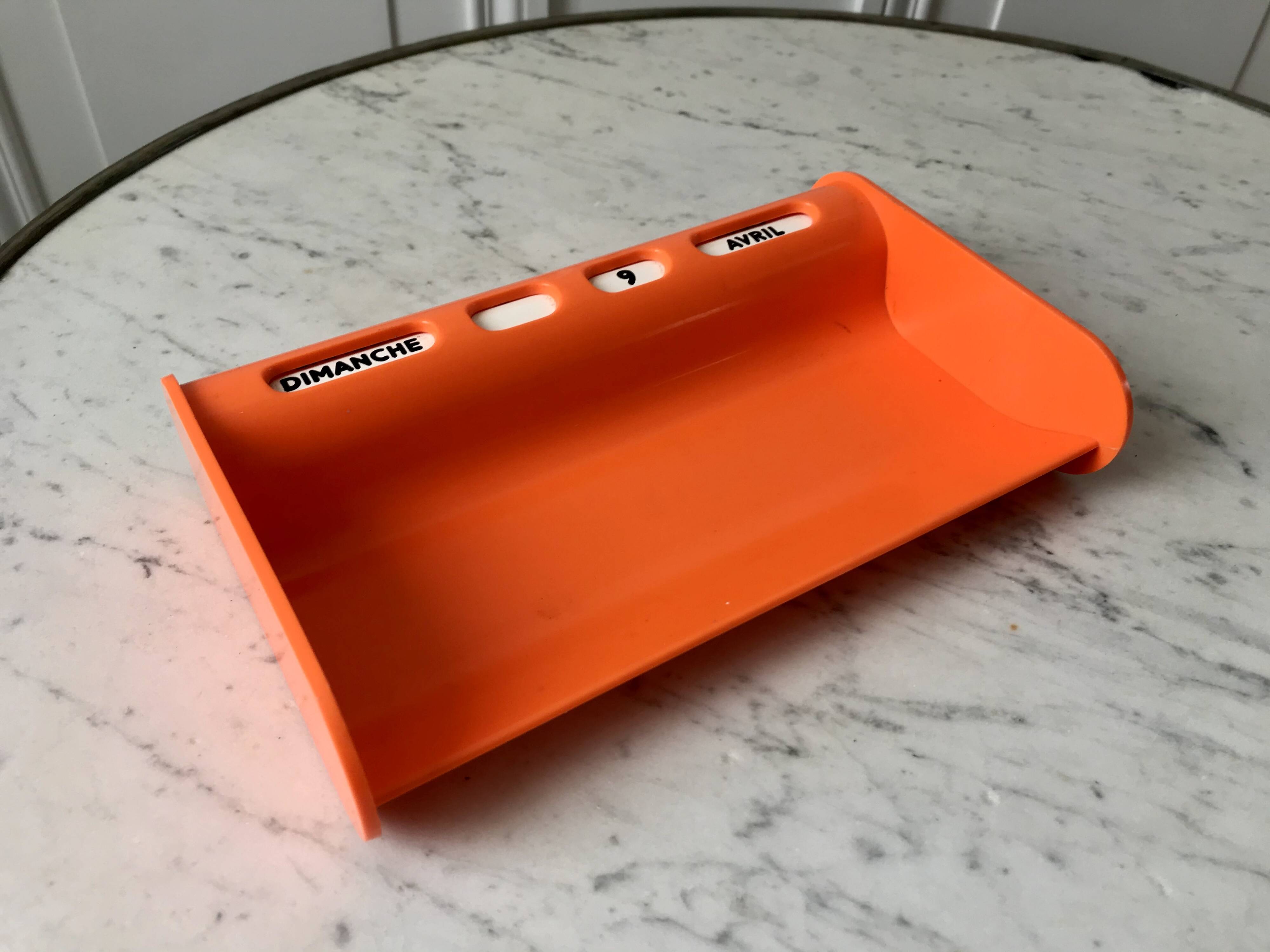 Dater empty pocket in orange plastic seventies 70s