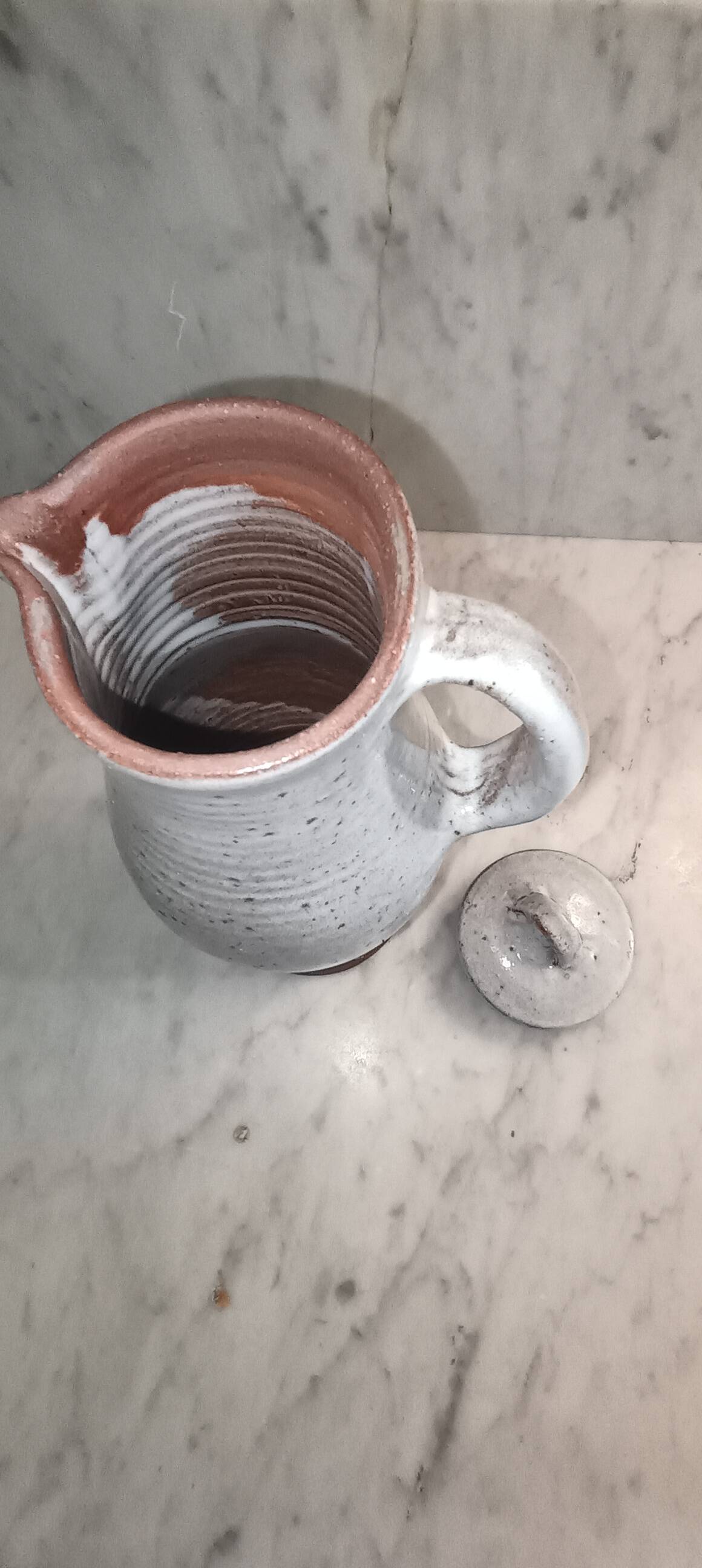 Ceramic pitcher signed by jeanne and norbert pierlot