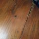 Round drop-leaf table in beech and pine