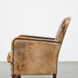 Fauteuil unique en cuir de mouton ancien