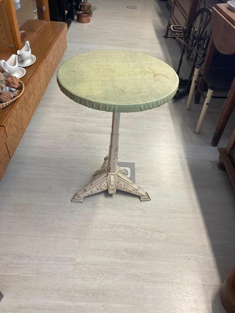 Round table with cast iron stand