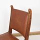 Pair of brutalist style chairs, in wood and leather.