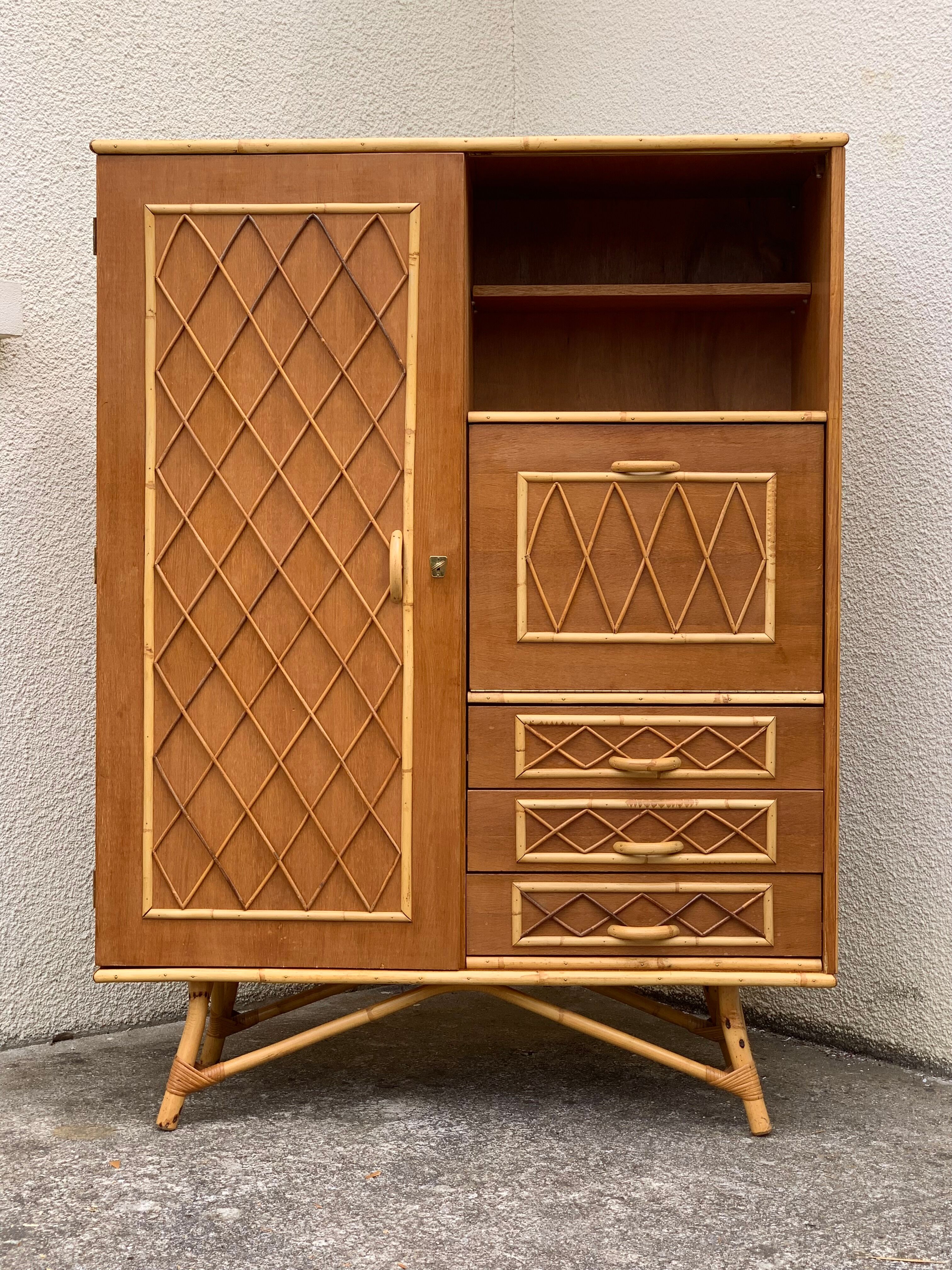 Rattan wardrobe with tapered legs from the 1960s.
