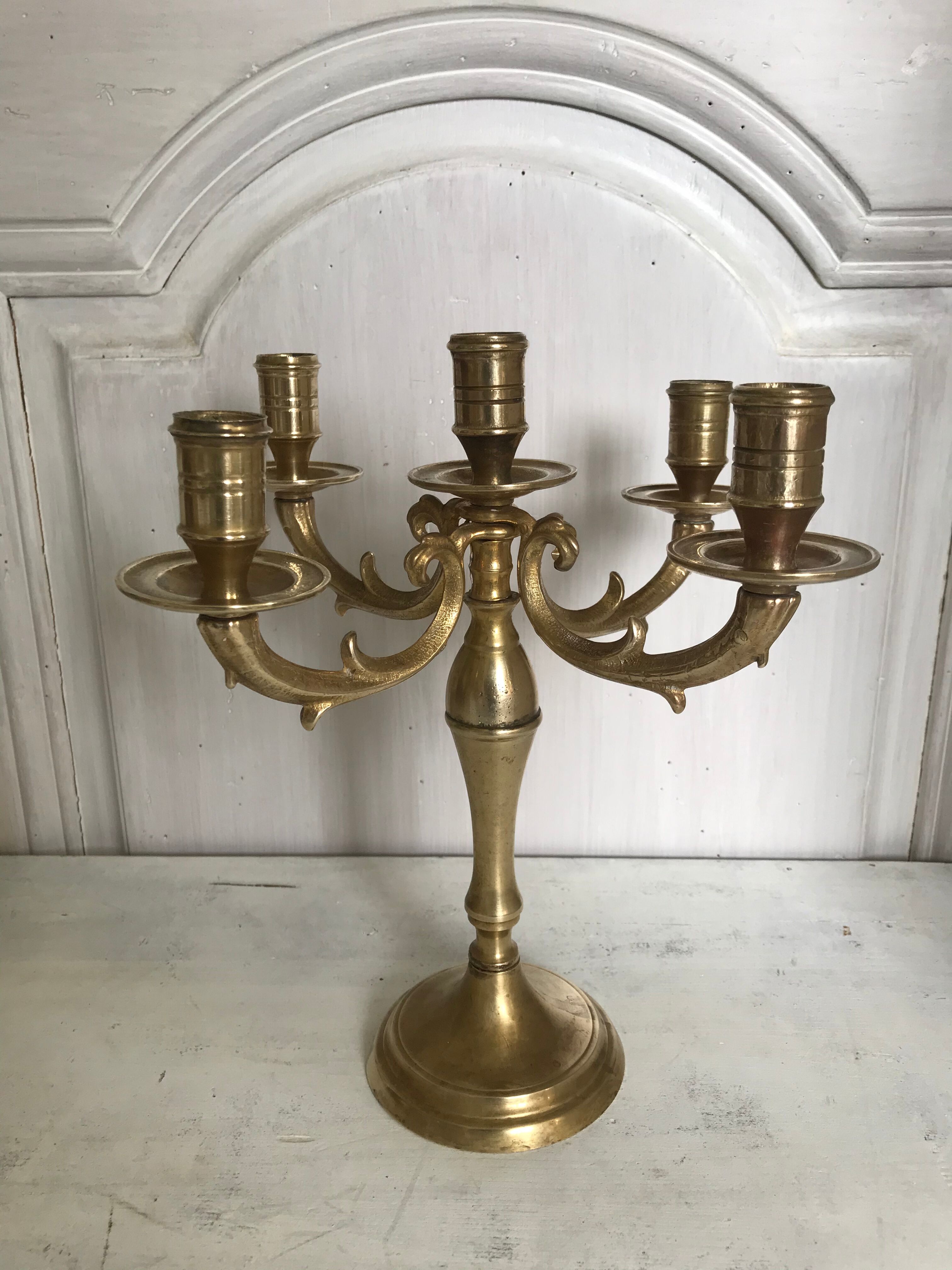 Ancient gilded bronze candlestick