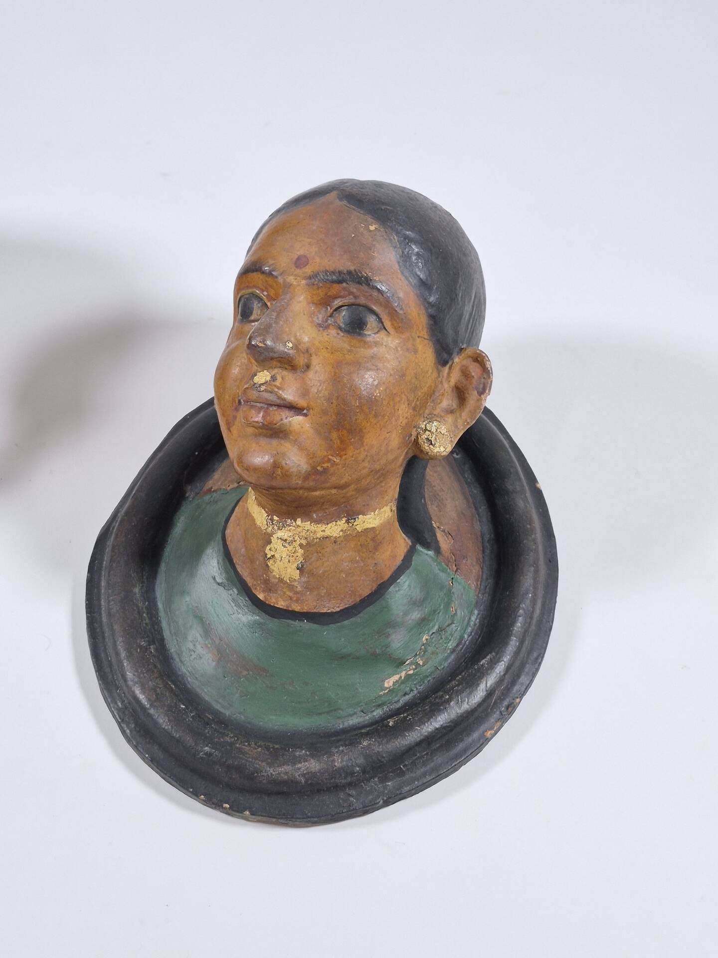 Pair of antique ceramic portrait busts from Rajasthan