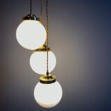 Three-light cascade suspension, vintage globes in white opaline