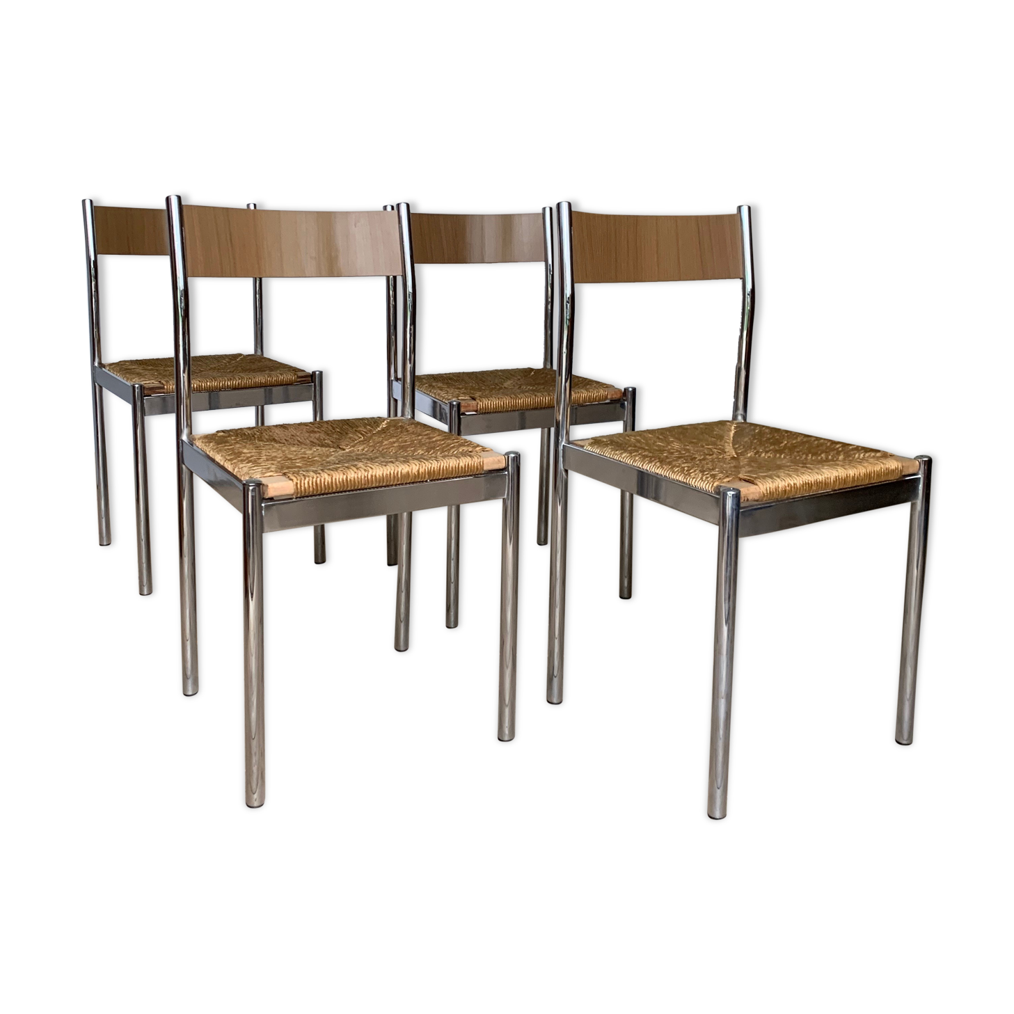 4 chrome and straw chairs