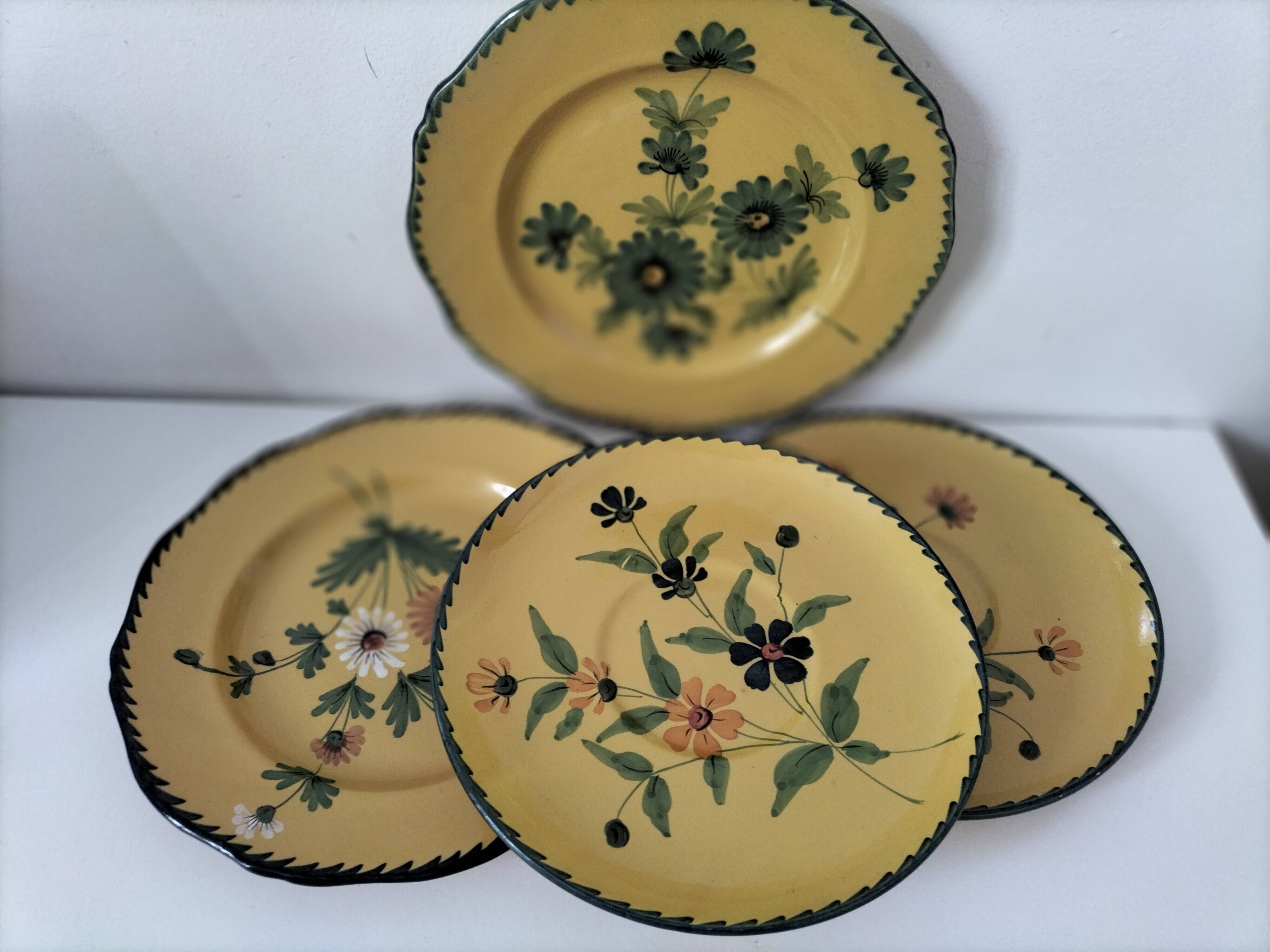 4 antique plates in hand-painted faience