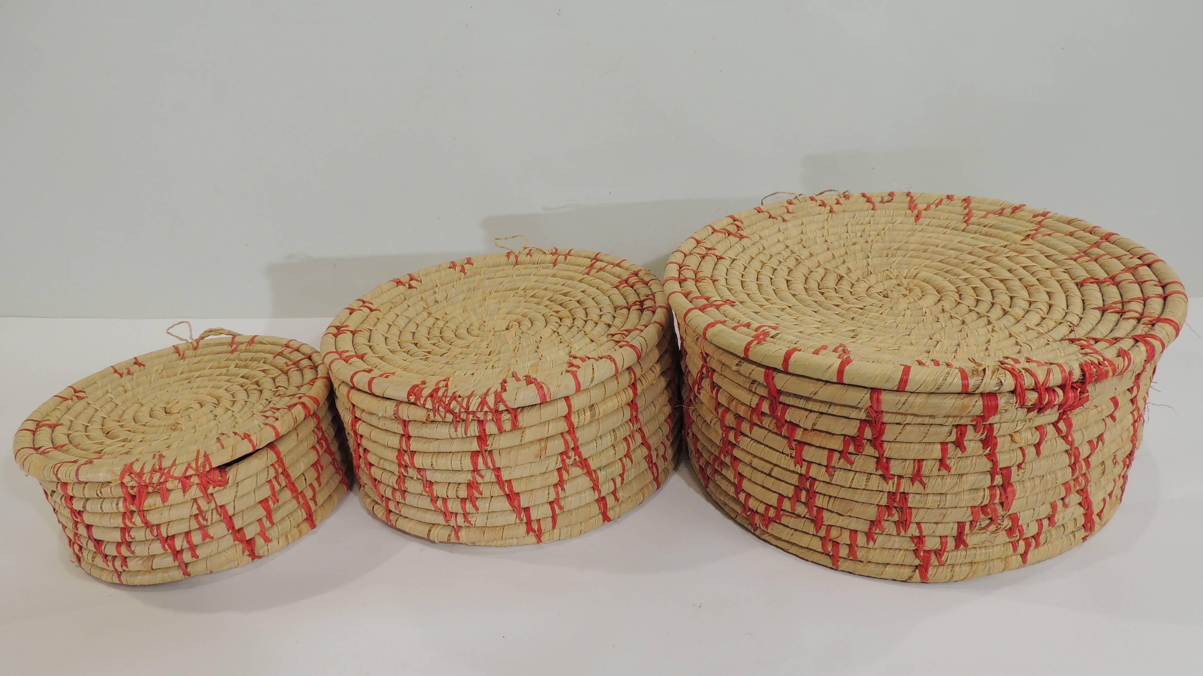 Set of three african raffia basket