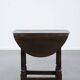 Antique English drop-leaf joint stool made of oak from the 18th century