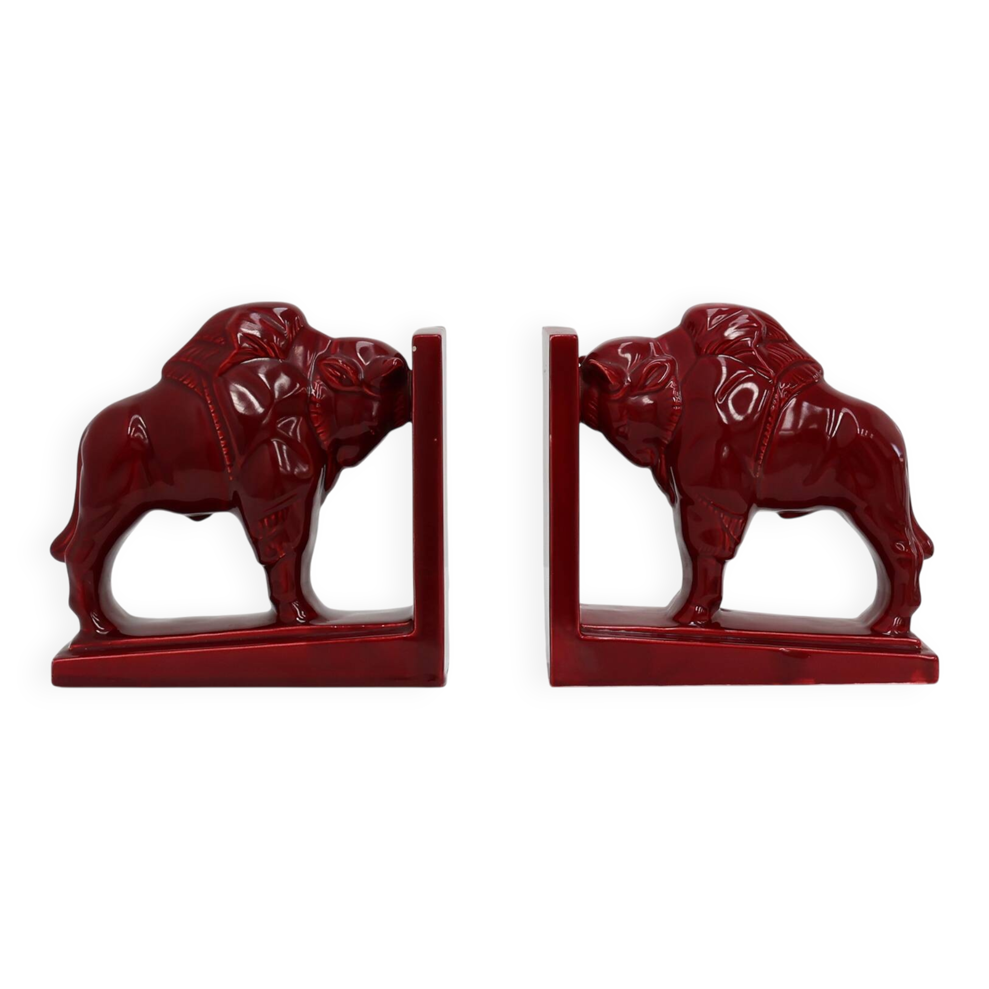 Pair of red glazed ceramic Bison ox bookends in Art Deco style, Belgium