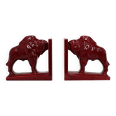 Pair of red glazed ceramic Bison ox bookends in Art Deco style, Belgium