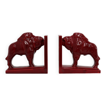 Pair of red glazed ceramic Bison ox bookends in Art Deco style, Belgium