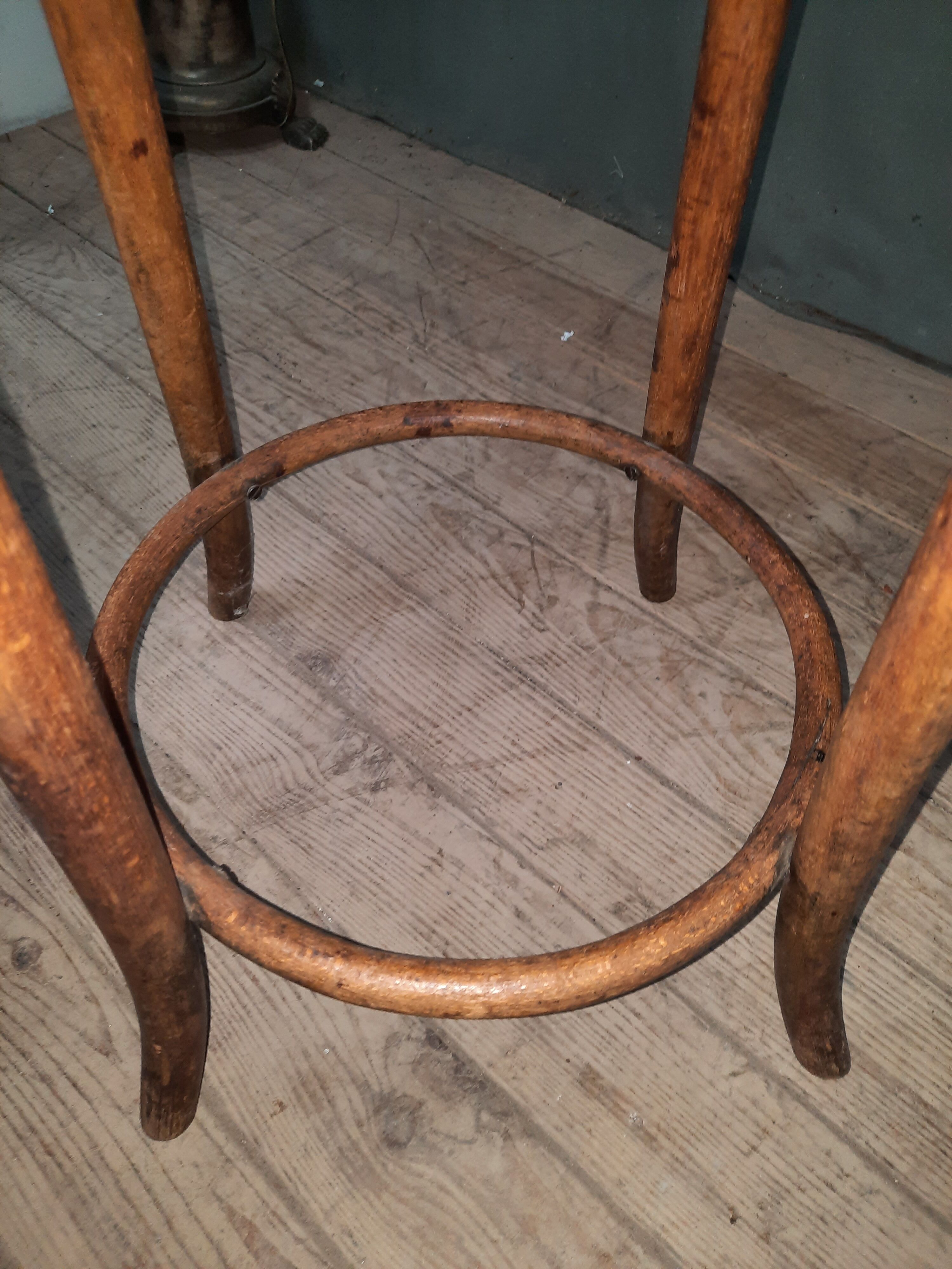 High bent wooden stool
