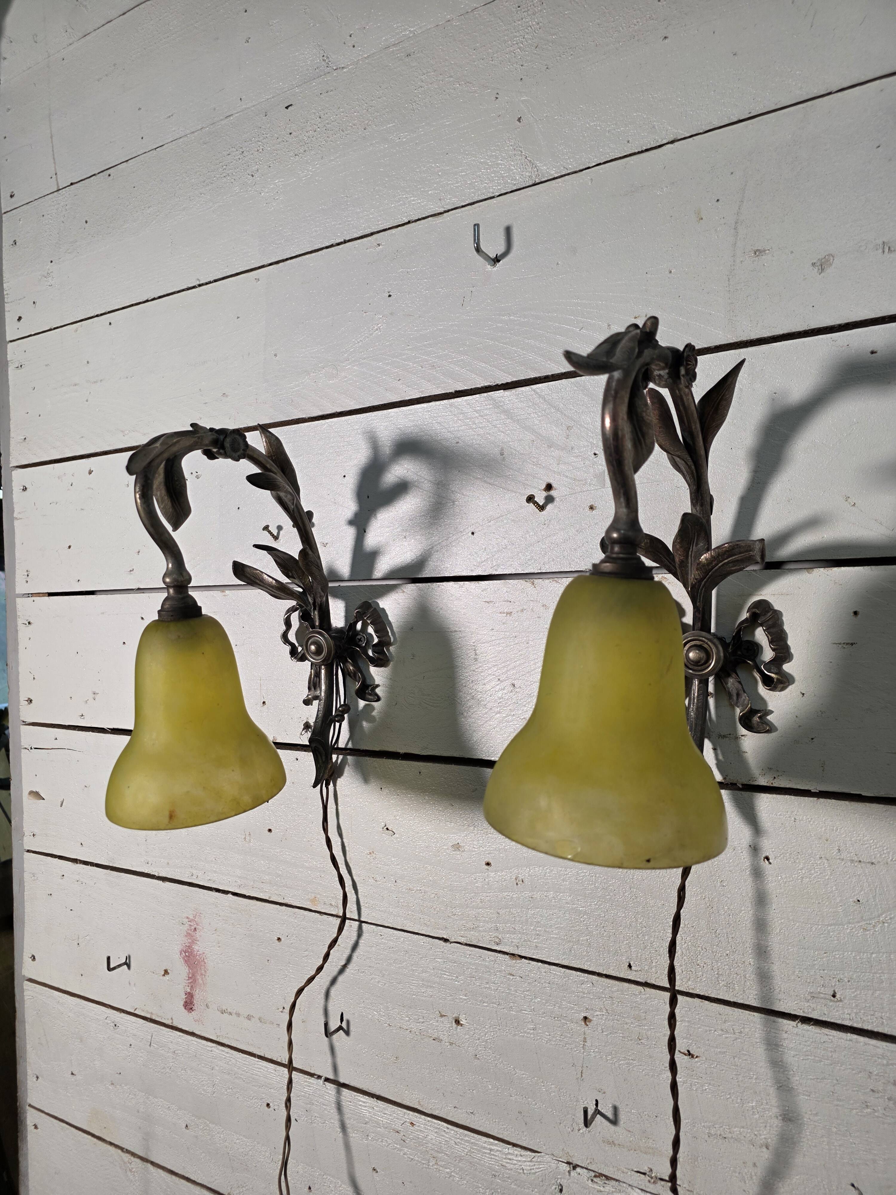 Pair of Louis XVI style bronze wall sconces