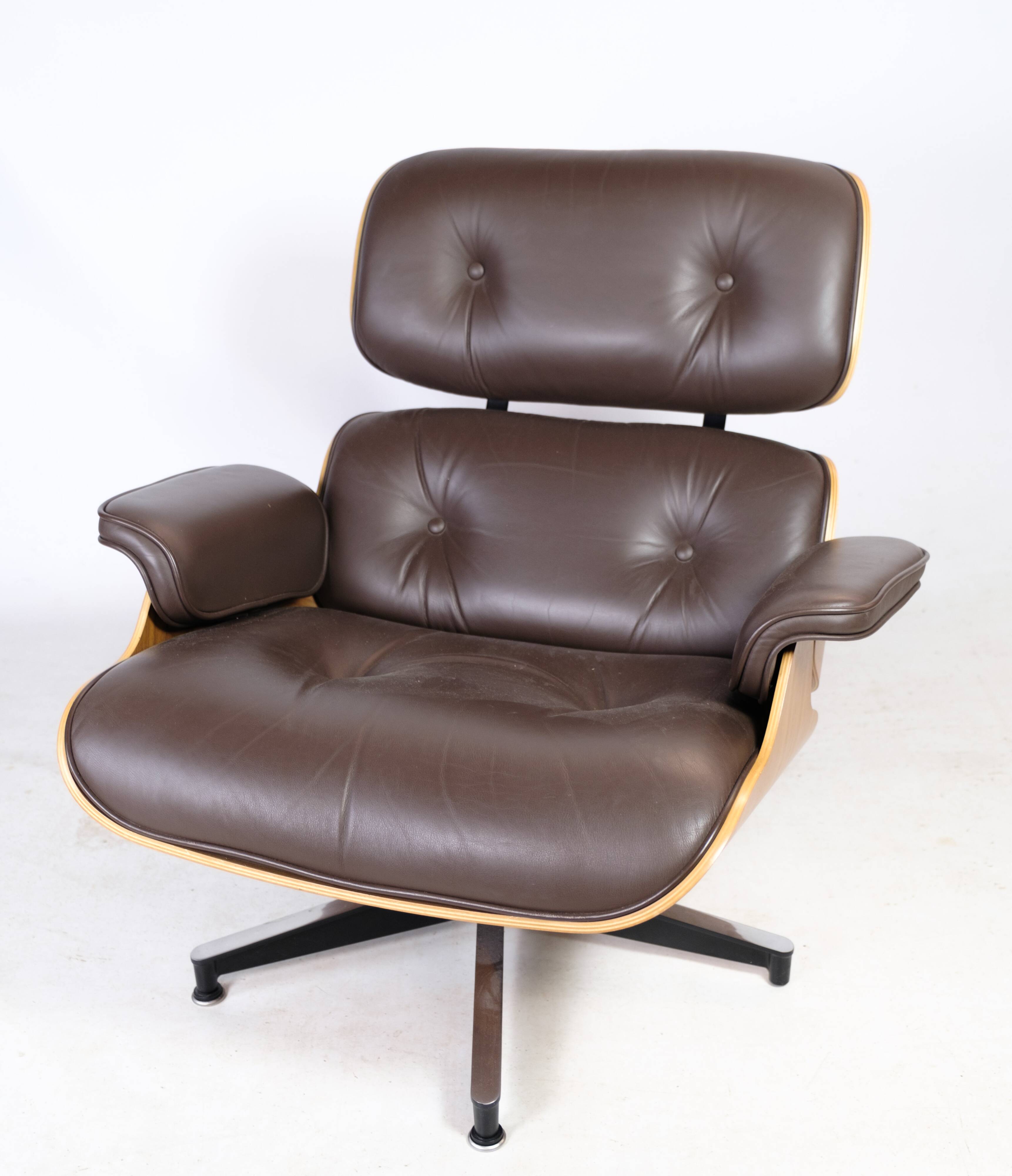 Charles Eames Lounge Chair In Brown Leather And Light Walnut
