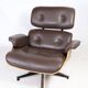 Fauteuil lounge Charles Eames en cuir marron et noyer clair