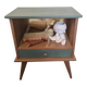 Renovated vintage bedside table in wood, with tapered legs – Matt green & gold background