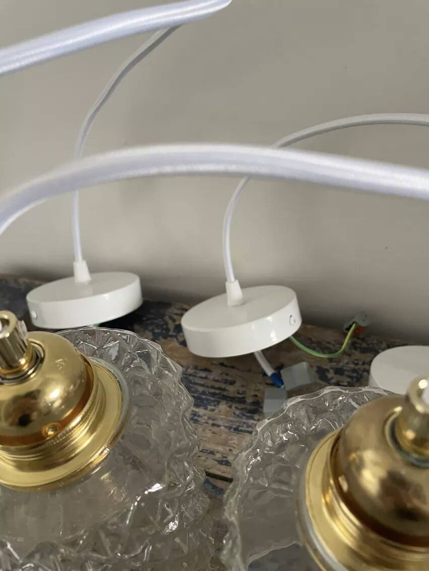 Set of three chiseled glass pendant lights of Scandinavian origin