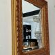 Old Beveled mirror in gilded wood