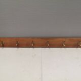 Coat rack in teak and brass. Denmark 1970-80s