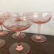 Champagne glass in pink glass with floral engraving