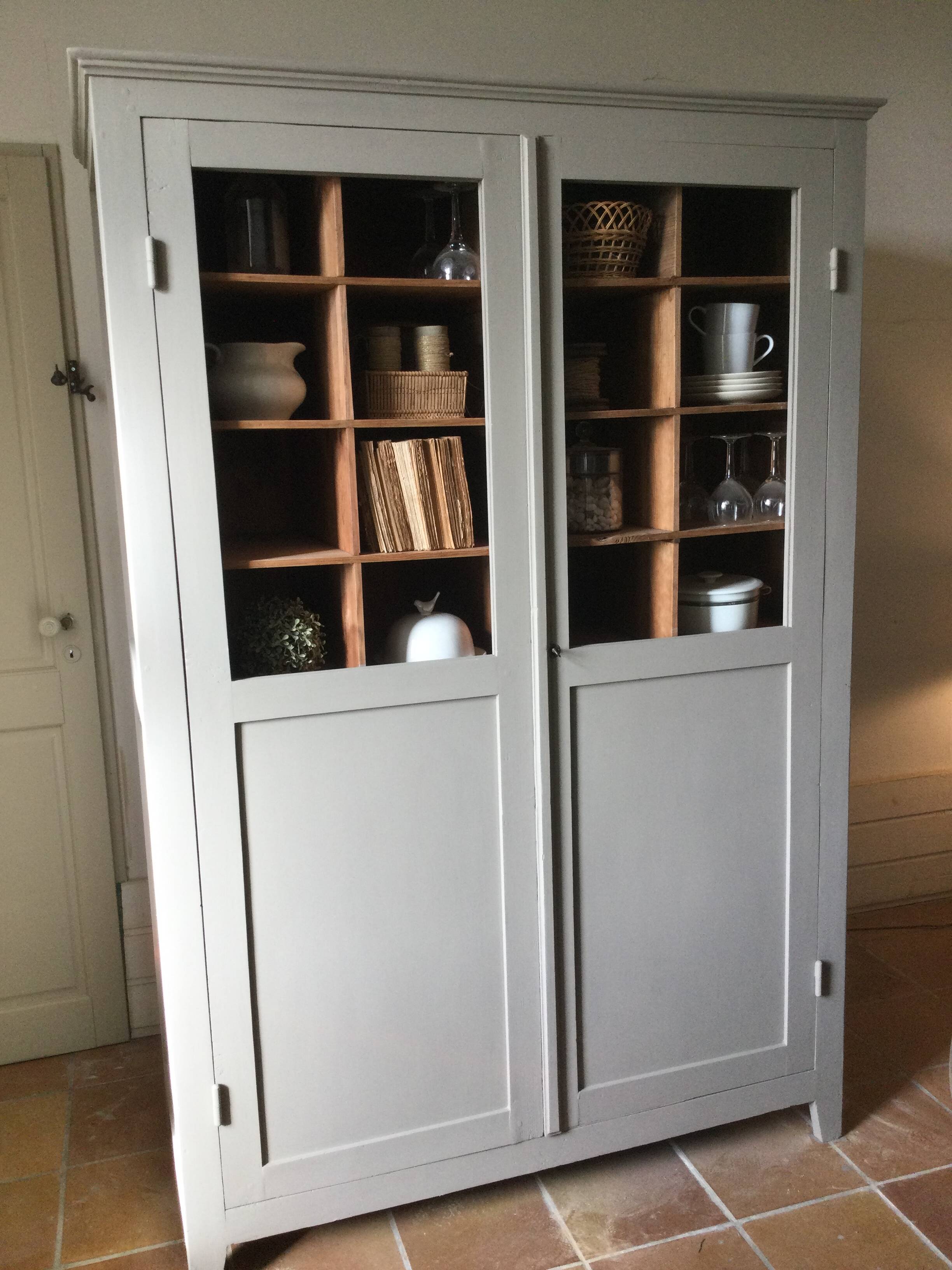 Antique Parisian wardrobe with interior compartments.