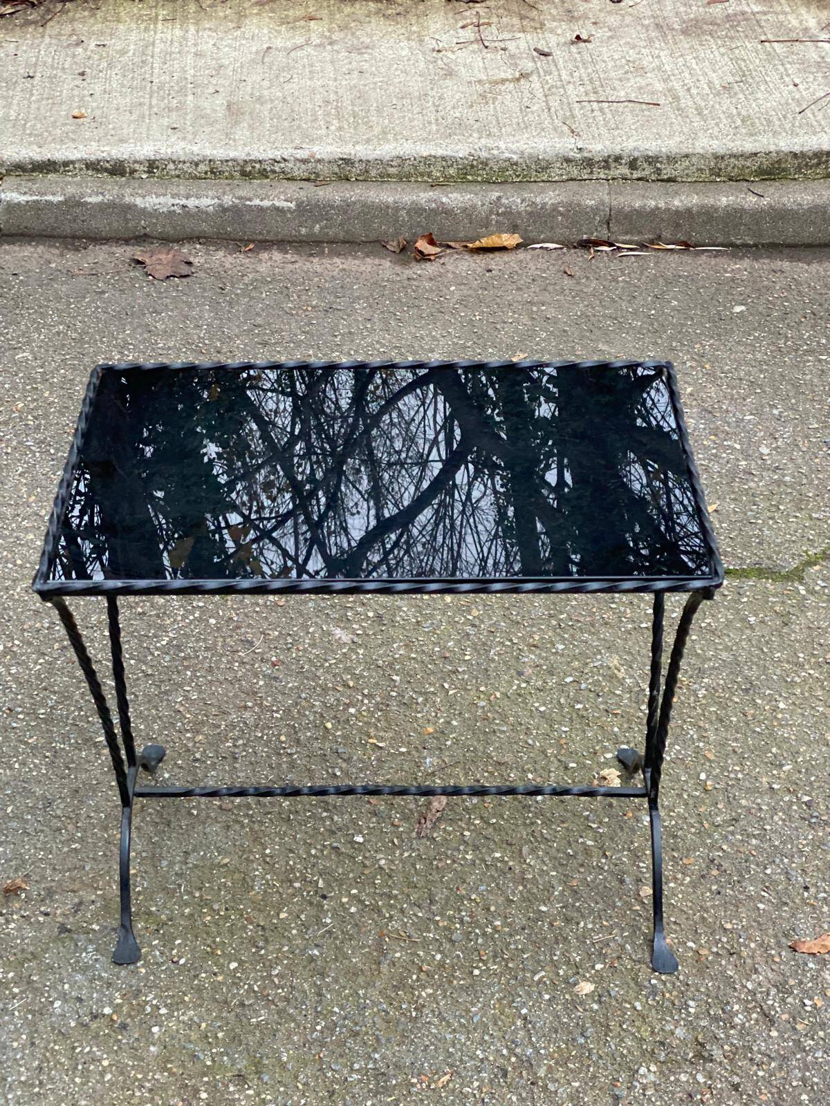 Coffee table/side table in the style of Jacques Adnet, made of steel and glass