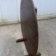 Old folding round winemaker's table with a tilting top.