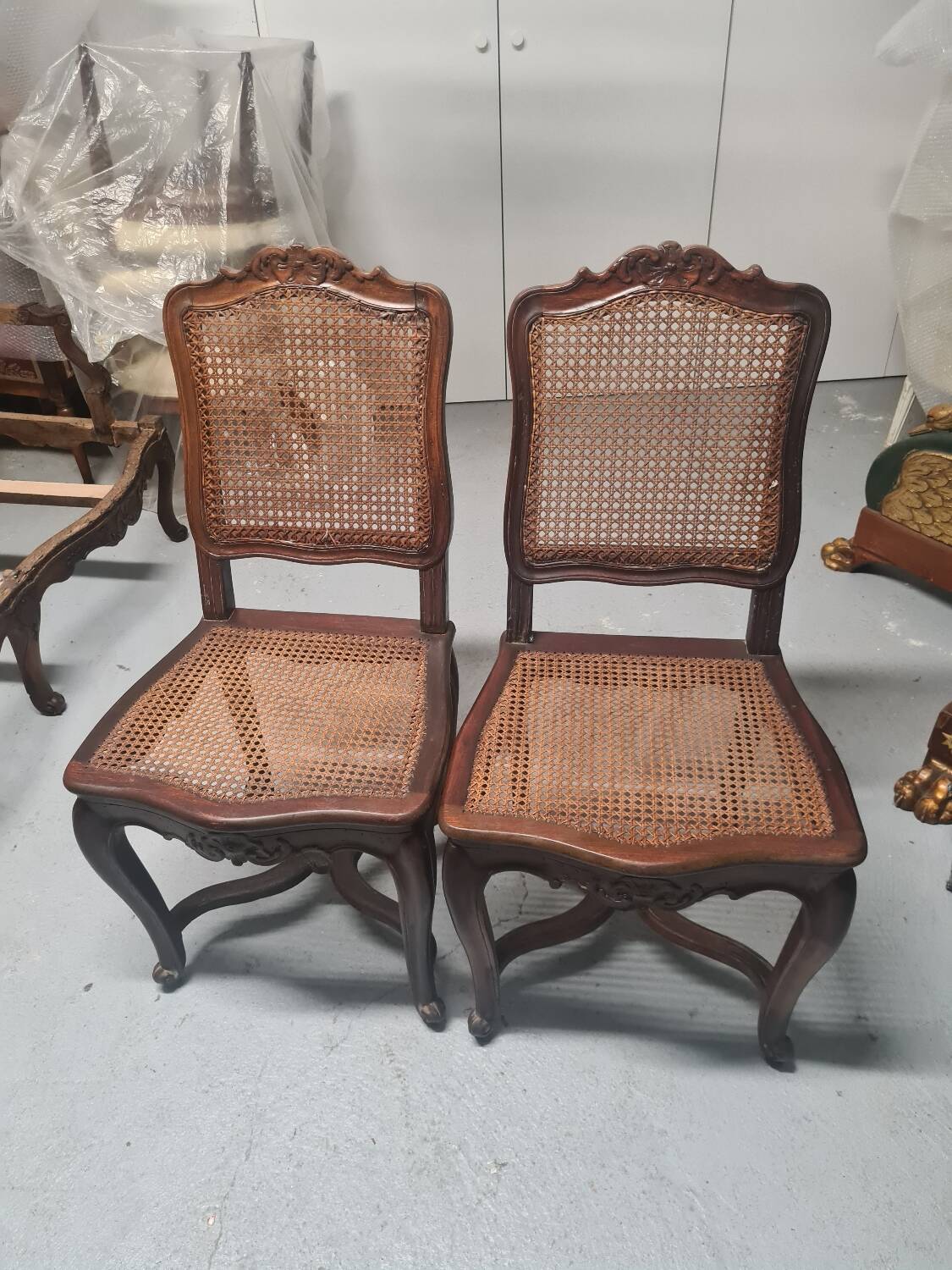 Pair of waxed Louis X period chairs