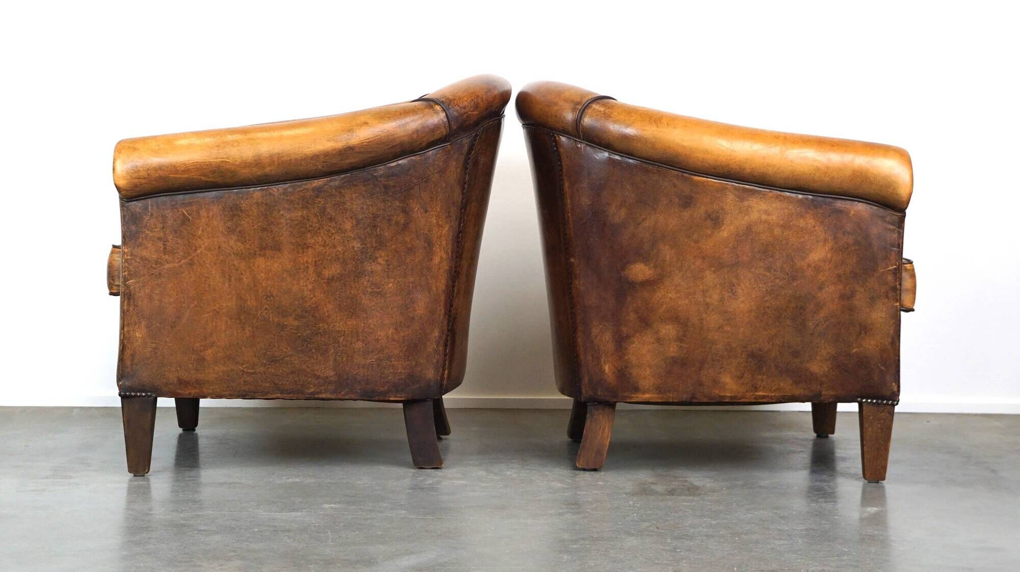 Set of 2 stylish yet beautiful and comfortable sheepskin club armchairs