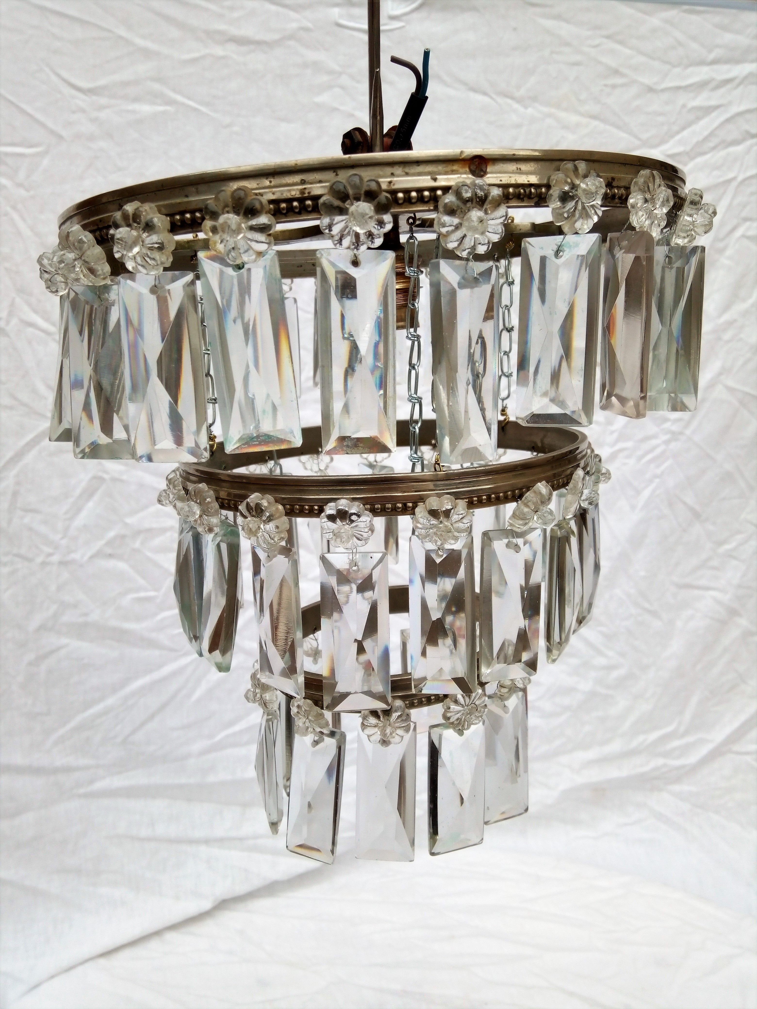 Ancient chandelier, bronze ceiling and stamps, 1900s