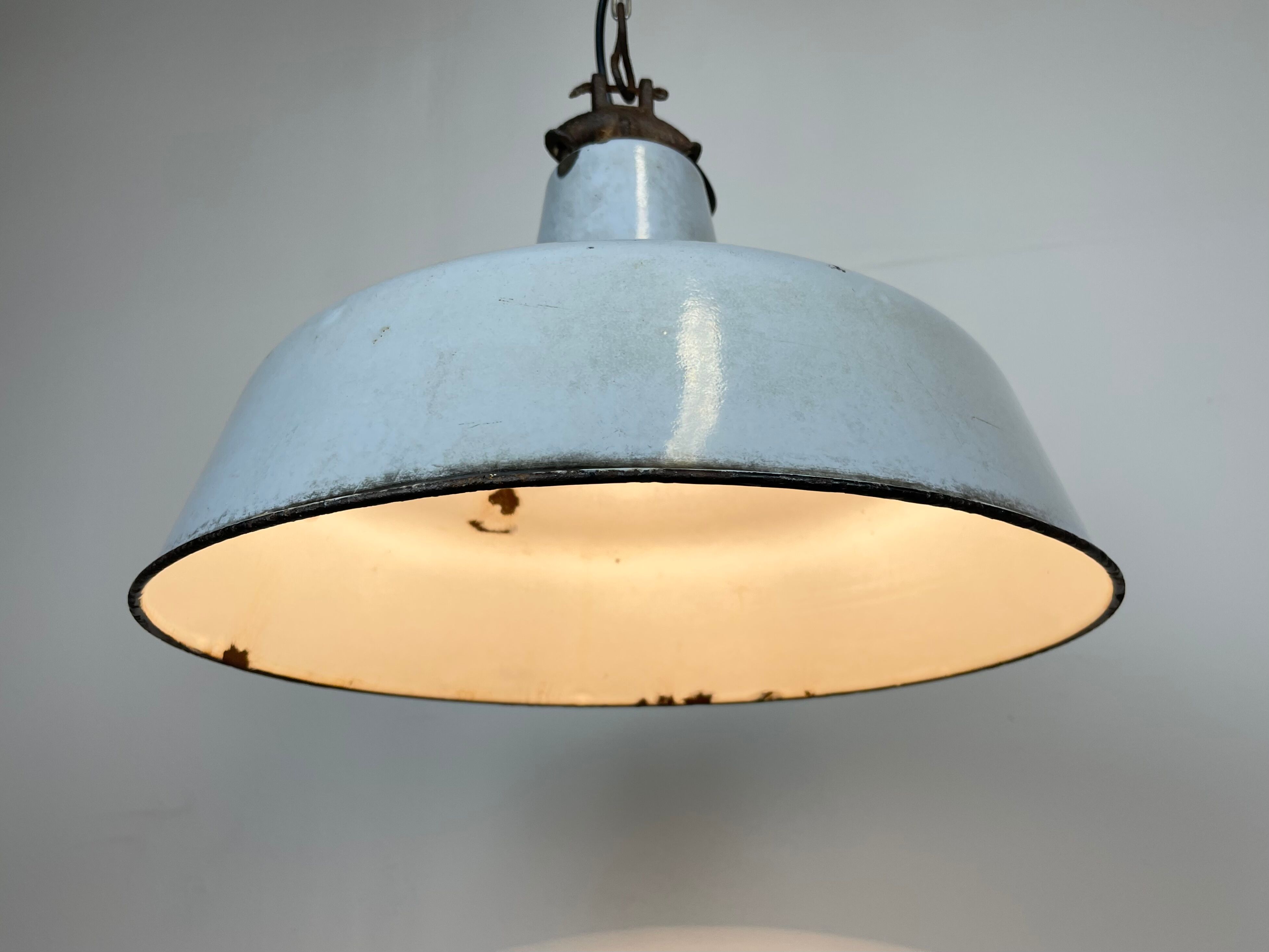 Industrial light grey enamel factory lamp with cast iron top, 1950s